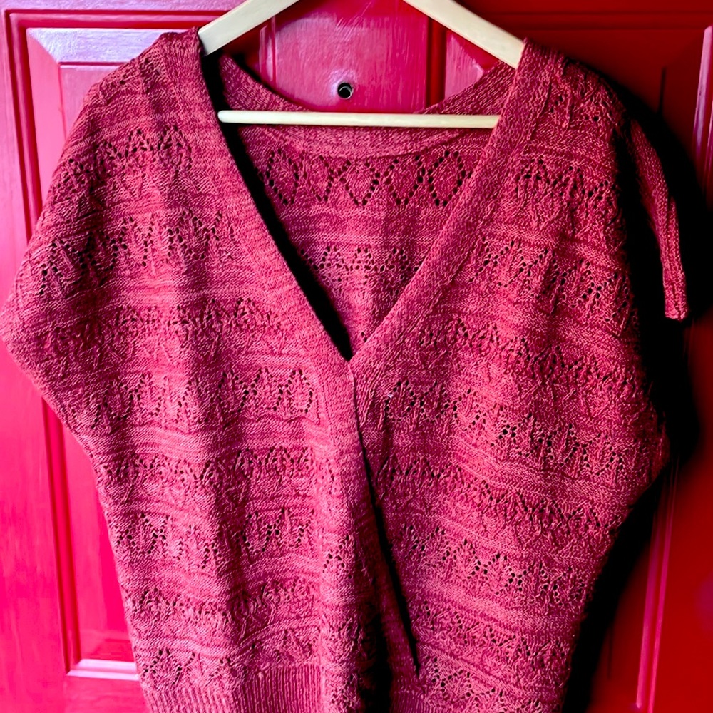 New without tags due to mail order, gorgeous sweater with peek holes.